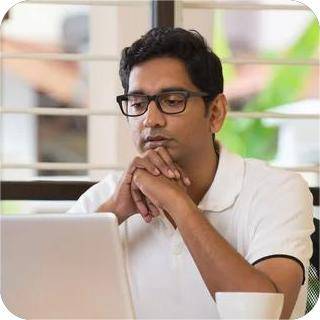 depositphotos 115702488 stock photo indian businessman at office min 1 thebrandingguru.com